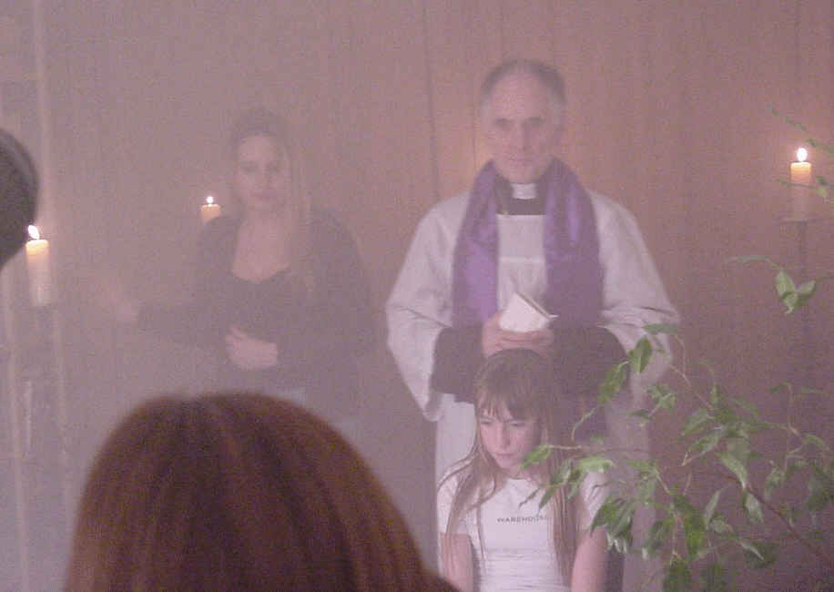 Zoe (Ella) with screen mum and Priest being exorsised.