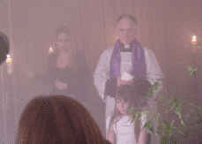 Zoe (Ella) with screen mum and Priest being exorsised.